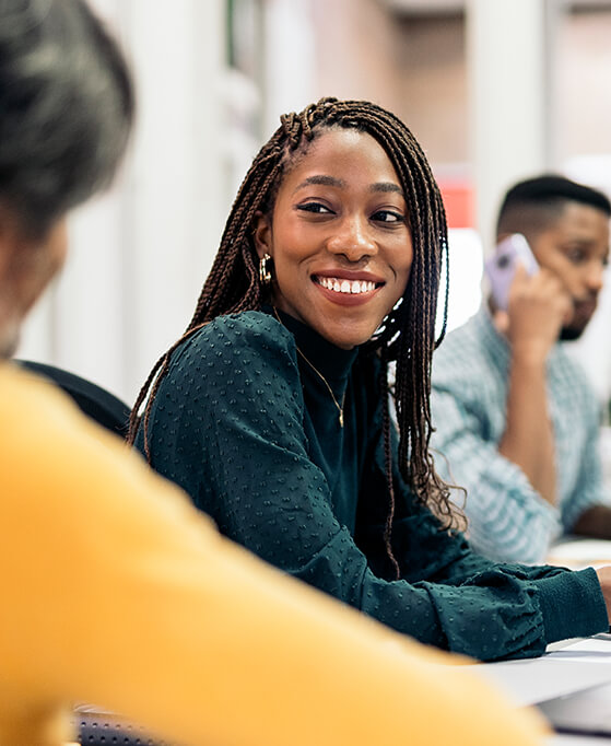 woman smiling at co-worker