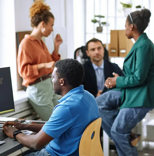 man-at-computer-in-office-aura-size